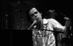https://upload.wikimedia.org/wikipedia/commons/f/f5/Nick_Cave_and_the_bad_seeds_live_%40_Paladozza_%2811174862314%29.jpg